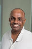 Duminda Wijesekera wears a white shirt in his faculty profile for the Cyber Security Engineering and Computer Science departments at George Mason University.